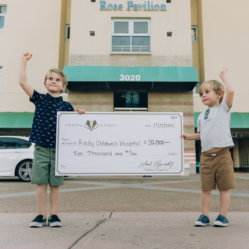Rady's Children Hospital Give Back Donation Check held by children